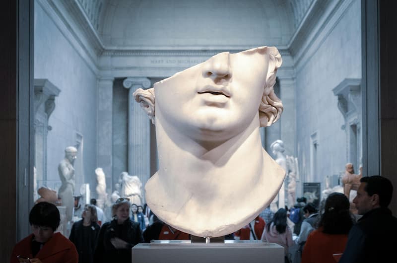 A portrait image of the a greek statue bust
